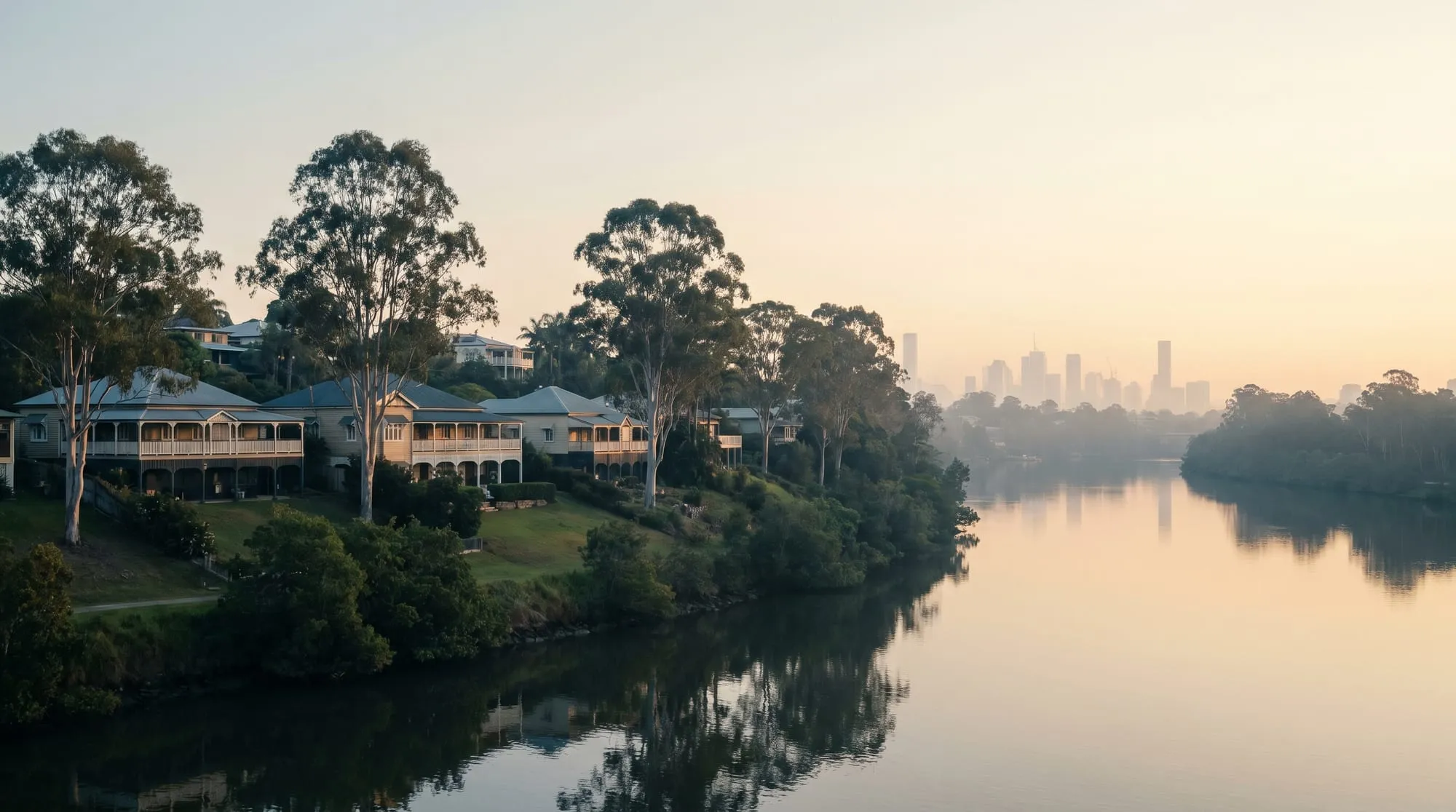Riverside homes among the gums in South East Queensland at golden hour